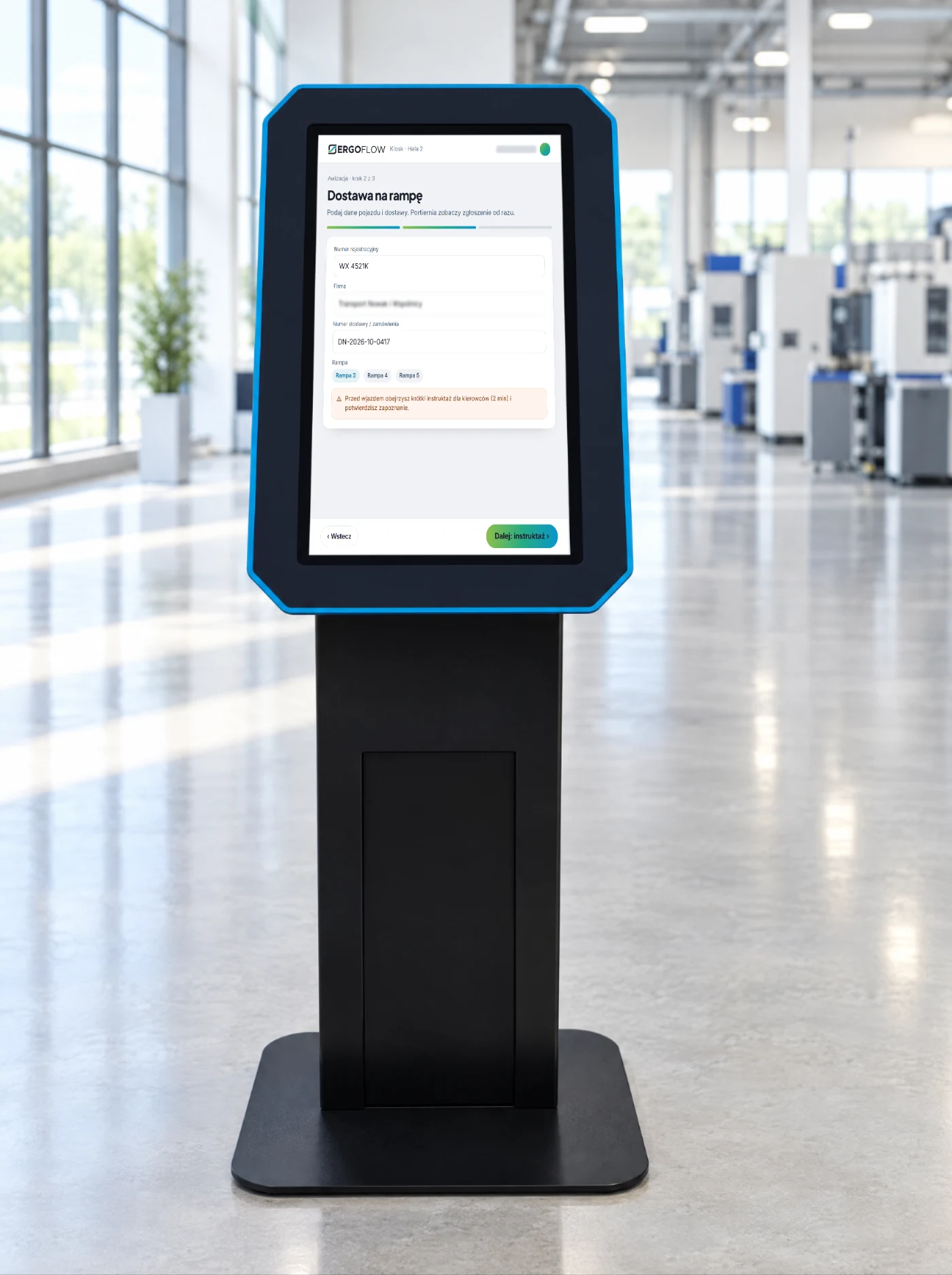 Kiosk w hali, na ekranie: awizacja kierowcy.