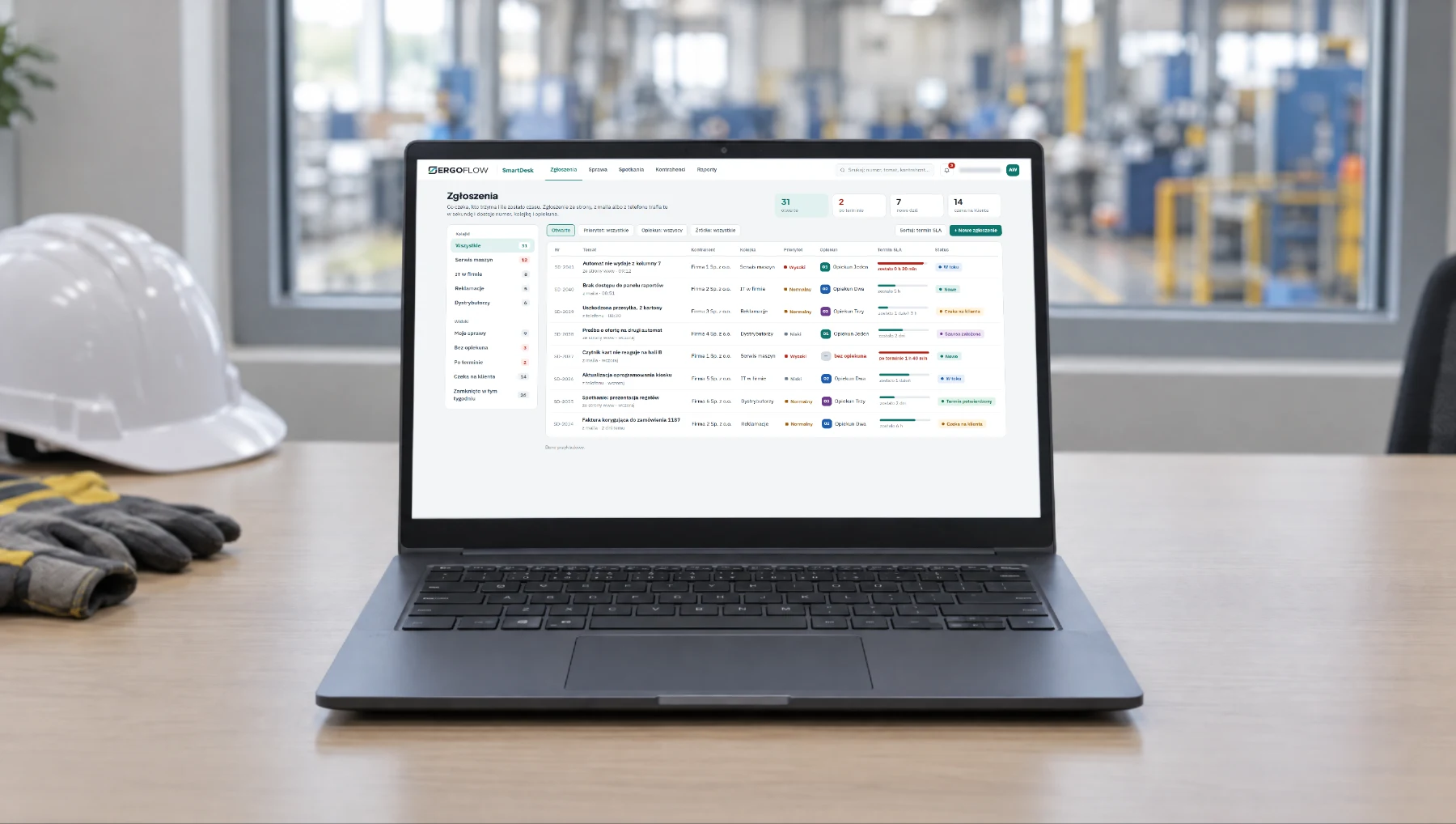 A laptop with the SmartDesk ticket list: queues, assignees, deadline bars.
